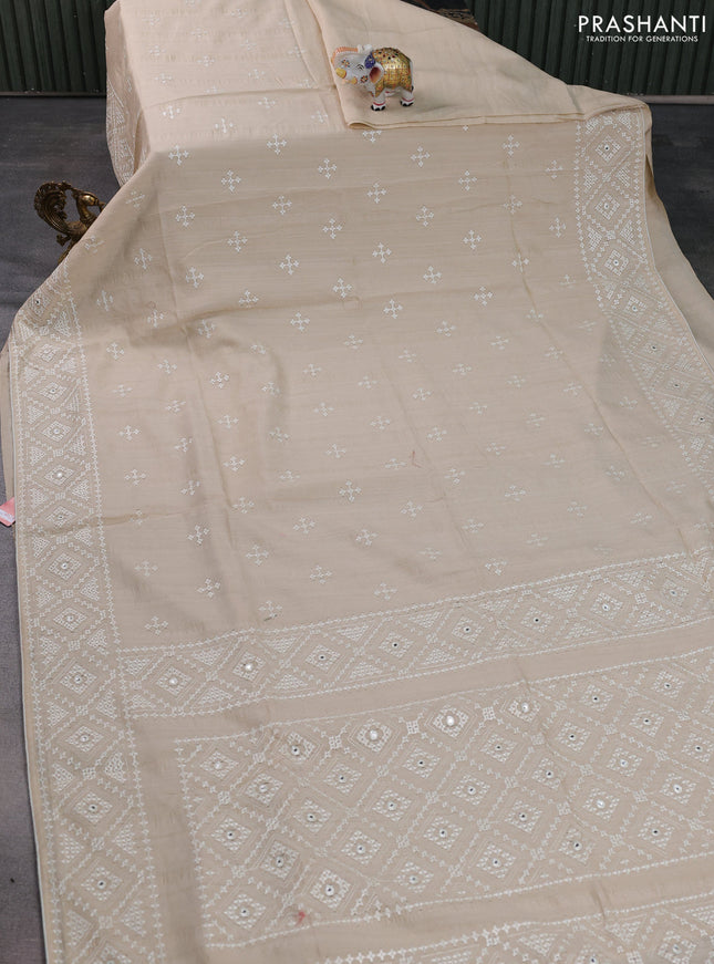 Semi tussar saree beige and cream with embroidery work buttas and embroidery mirror work border