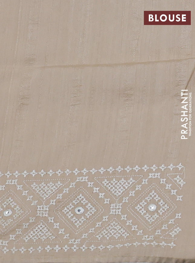 Semi tussar saree beige and cream with embroidery work buttas and embroidery mirror work border