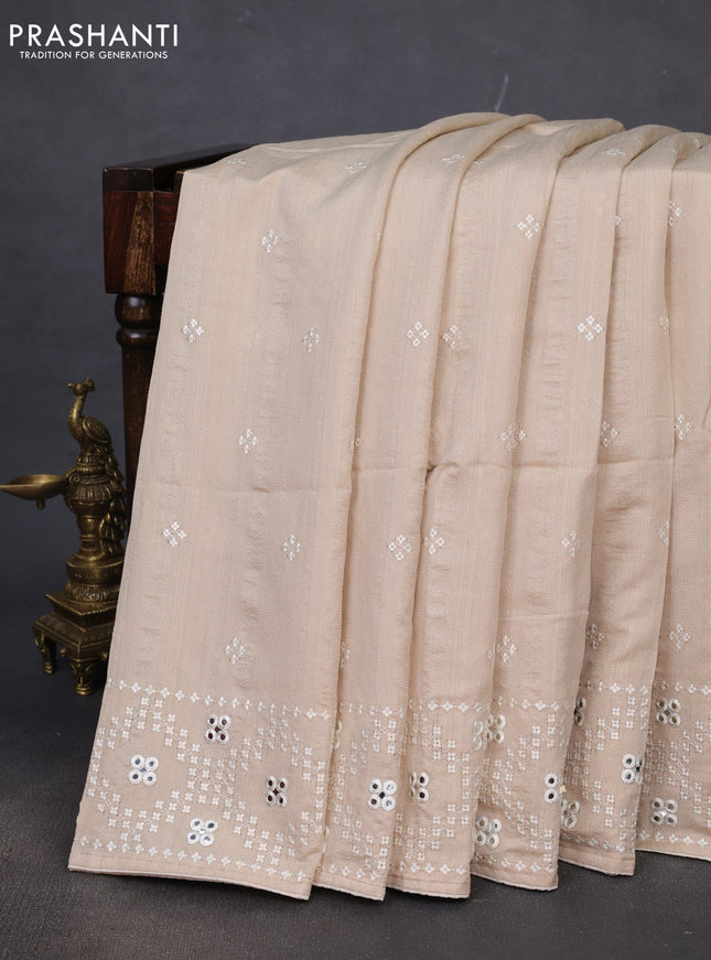Semi tussar saree beige and cream with embroidery work buttas and embroidery mirror work border