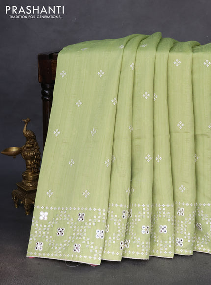 Semi tussar saree pista green and cream with embroidery work buttas and embroidery mirror work border
