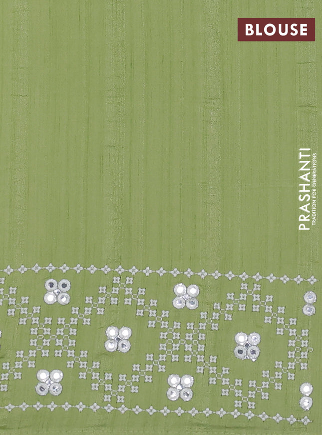 Semi tussar saree pista green and cream with embroidery work buttas and embroidery mirror work border