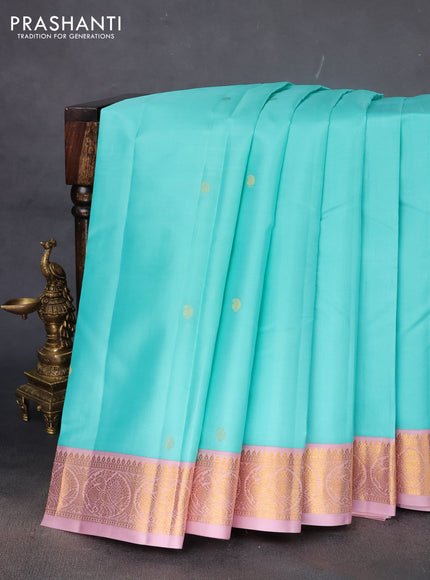Pure kanchipuram silk saree teal blue and pastel pink with zari woven buttas and zari woven korvai border