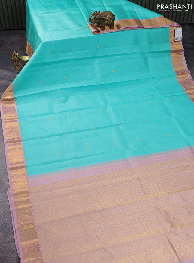 Pure kanchipuram silk saree teal blue and pastel pink with zari woven buttas and zari woven korvai border