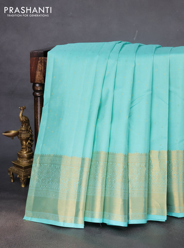Pure kanchipuram silk saree teal blue and pastel pink with allover zari weaves and long rich zari woven border