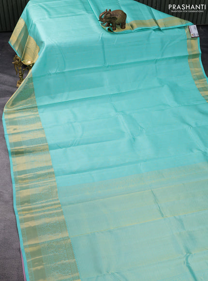 Pure kanchipuram silk saree teal blue and pastel pink with allover zari weaves and long rich zari woven border