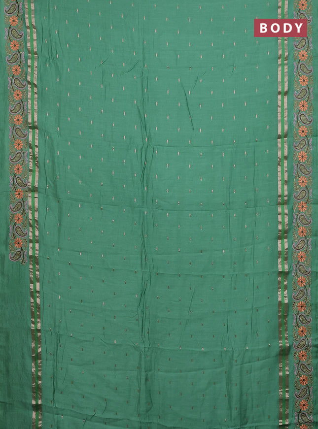 Semi chanderi saree green shade with zari woven buttas and embroidery border