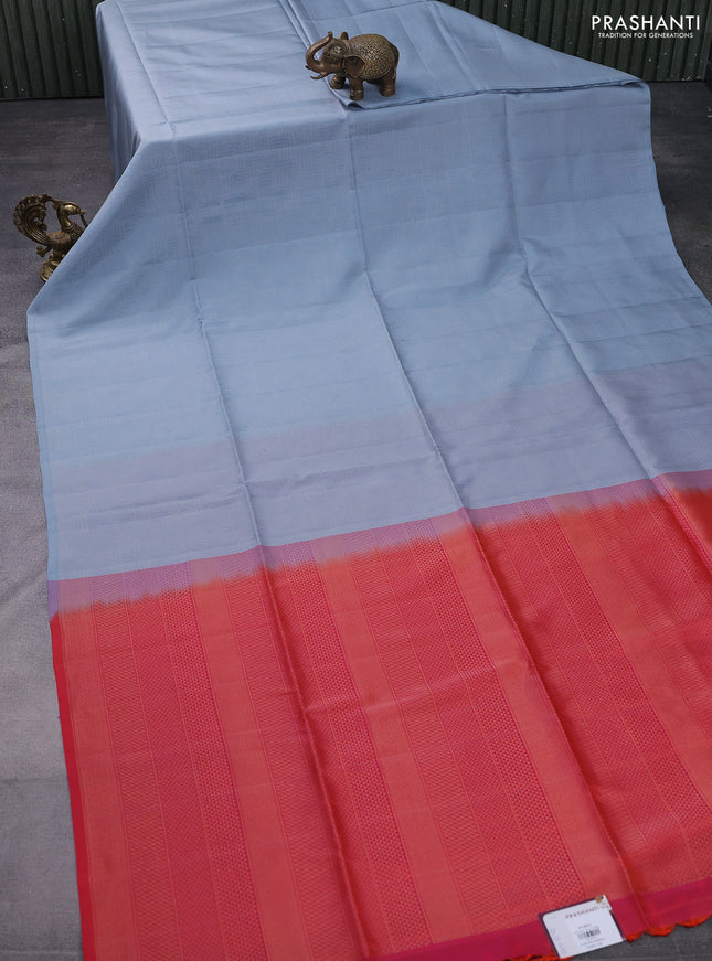 Kanchipuram soft silk saree pastel blue and dual shade of pinkish orange with allover zari weaves in borderless style