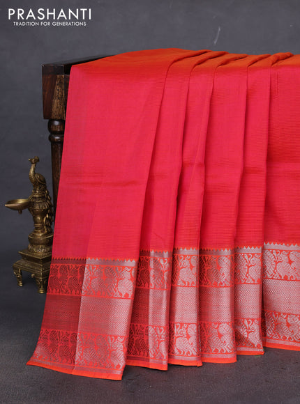 Mangalgiri silk cotton saree dual shade of reddish orange with plain body and silver zari woven border