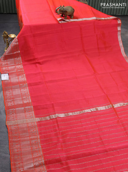 Mangalgiri silk cotton saree dual shade of reddish orange with plain body and silver zari woven border