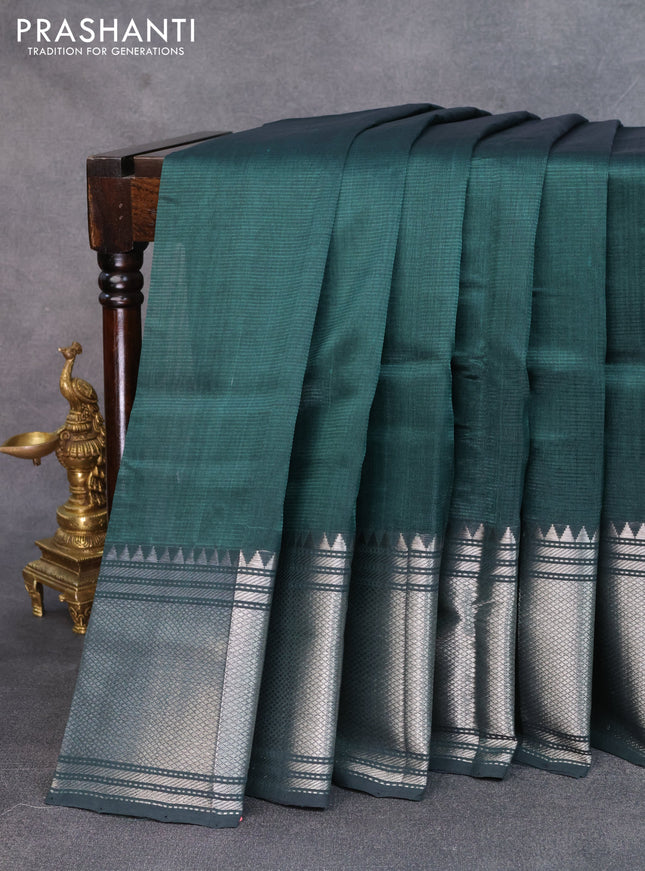 Mangalgiri silk cotton saree bottle green with plain body and long silver zari woven border