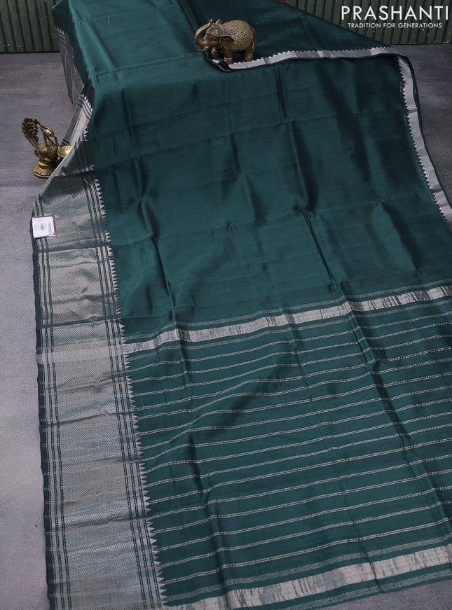 Mangalgiri silk cotton saree bottle green with plain body and long silver zari woven border