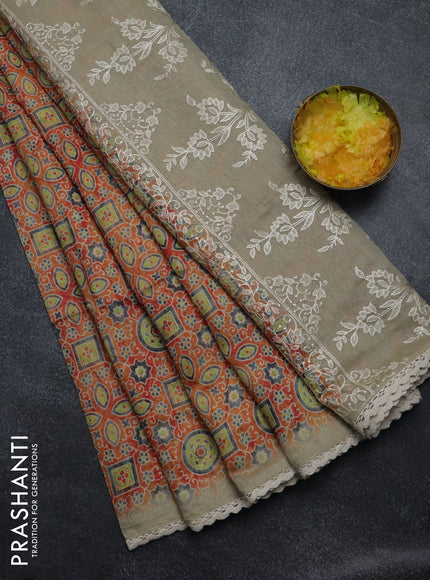 Semi chanderi saree orange and beige with allover ajrakh prints and embroidery pallu