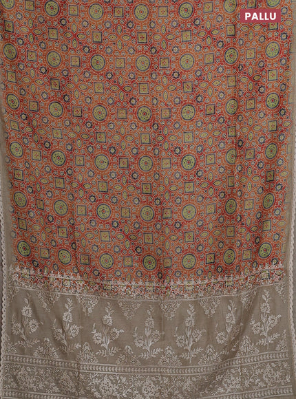 Semi chanderi saree orange and beige with allover ajrakh prints and embroidery pallu