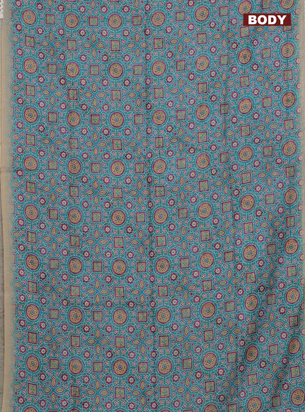Semi chanderi saree teal blue and beige with allover ajrakh prints and embroidery pallu