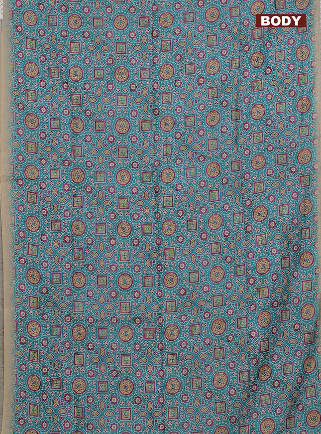 Semi chanderi saree teal blue and beige with allover ajrakh prints and embroidery pallu