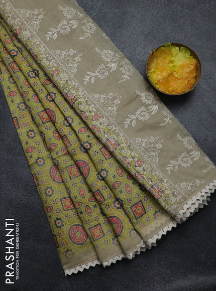 Semi chanderi saree lime green and beige with allover ajrakh prints and embroidery pallu
