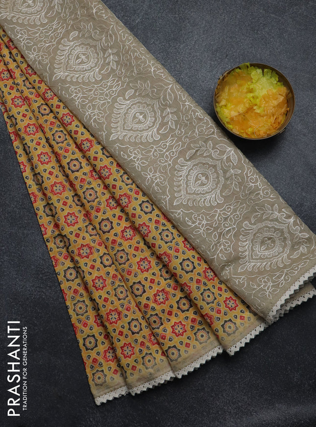 Semi chanderi saree yellow and beige with allover ajrakh prints and embroidery pallu