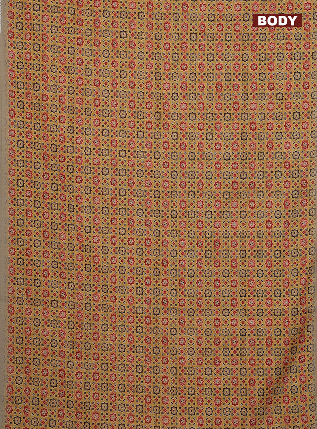 Semi chanderi saree yellow and beige with allover ajrakh prints and embroidery pallu
