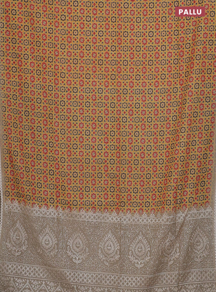 Semi chanderi saree yellow and beige with allover ajrakh prints and embroidery pallu