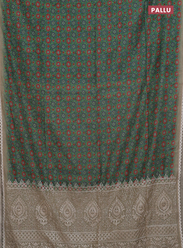 Semi chanderi saree green and beige with allover ajrakh prints and embroidery pallu