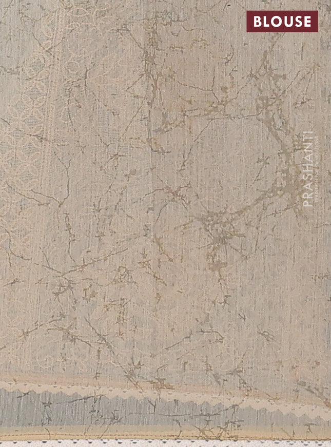 Semi chanderi saree grey blue and beige with floral butta prints and embroidery pallu