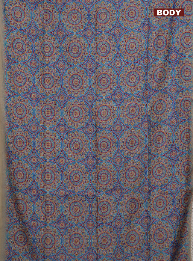 Semi chanderi saree cs blue and beige with allover ajrakh prints and embroidery pallu