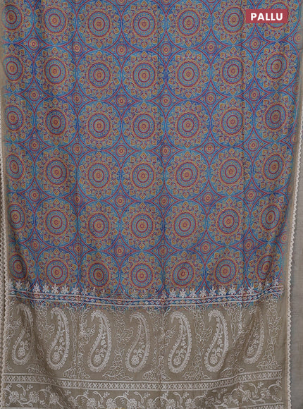 Semi chanderi saree cs blue and beige with allover ajrakh prints and embroidery pallu