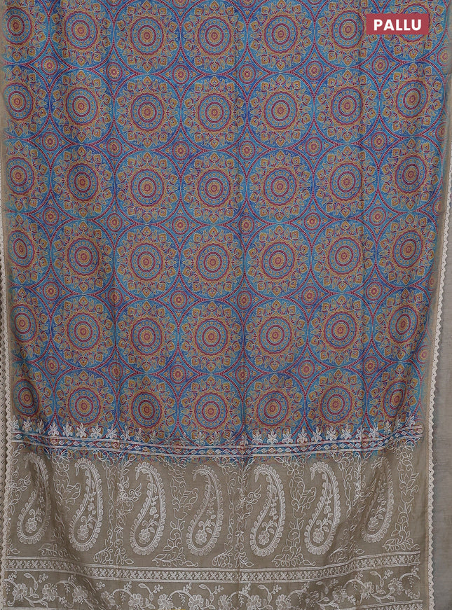 Semi chanderi saree cs blue and beige with allover ajrakh prints and embroidery pallu