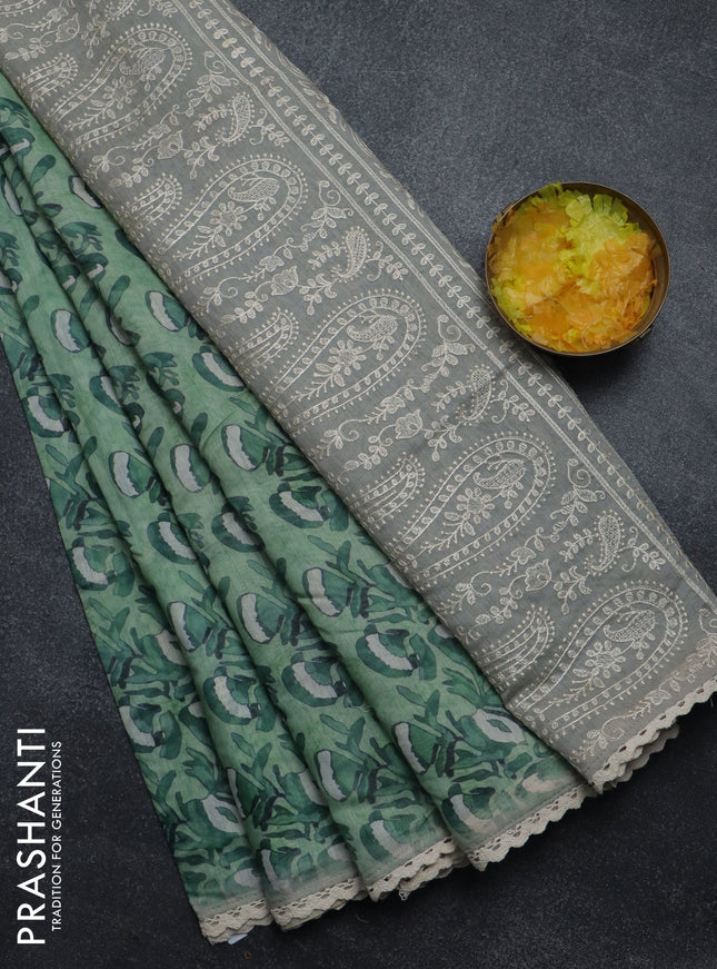 Semi chanderi saree green shade and grey with allover batik prints and embroidery pallu