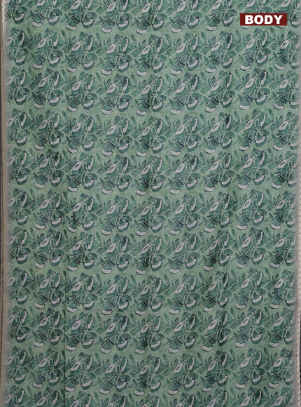 Semi chanderi saree green shade and grey with allover batik prints and embroidery pallu