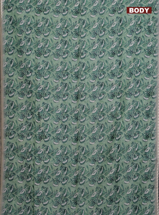 Semi chanderi saree green shade and grey with allover batik prints and embroidery pallu