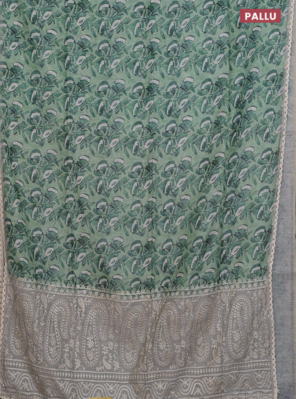 Semi chanderi saree green shade and grey with allover batik prints and embroidery pallu