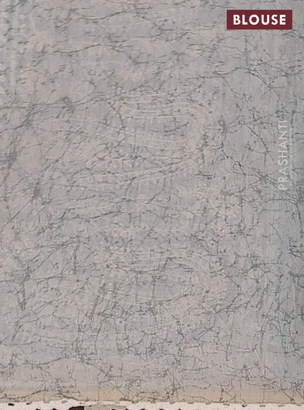 Semi chanderi saree green shade and grey with allover batik prints and embroidery pallu