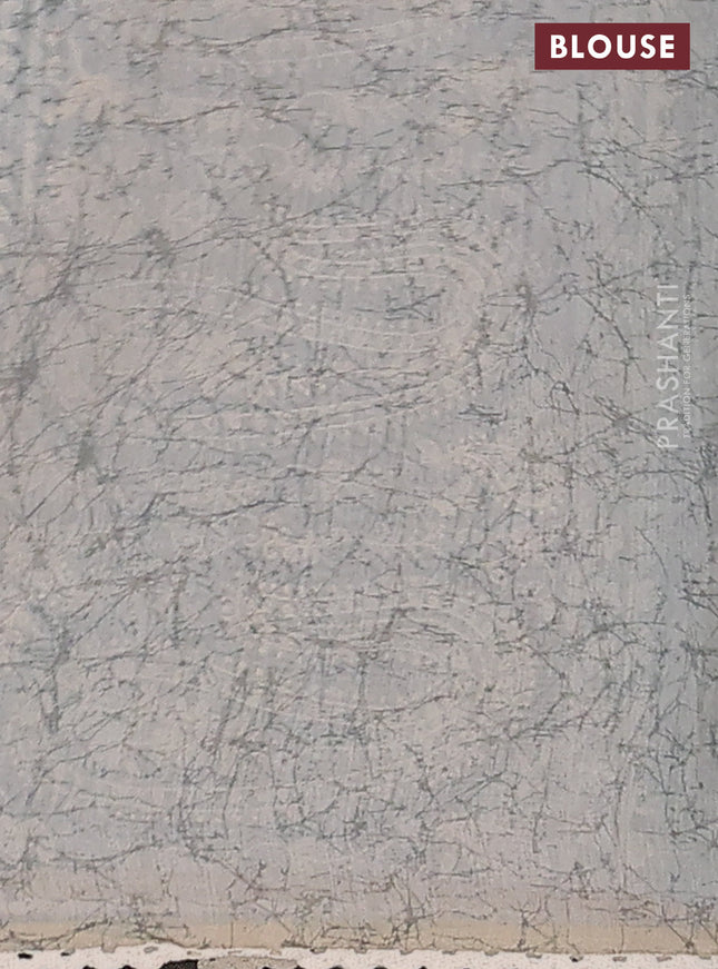 Semi chanderi saree green shade and grey with allover batik prints and embroidery pallu