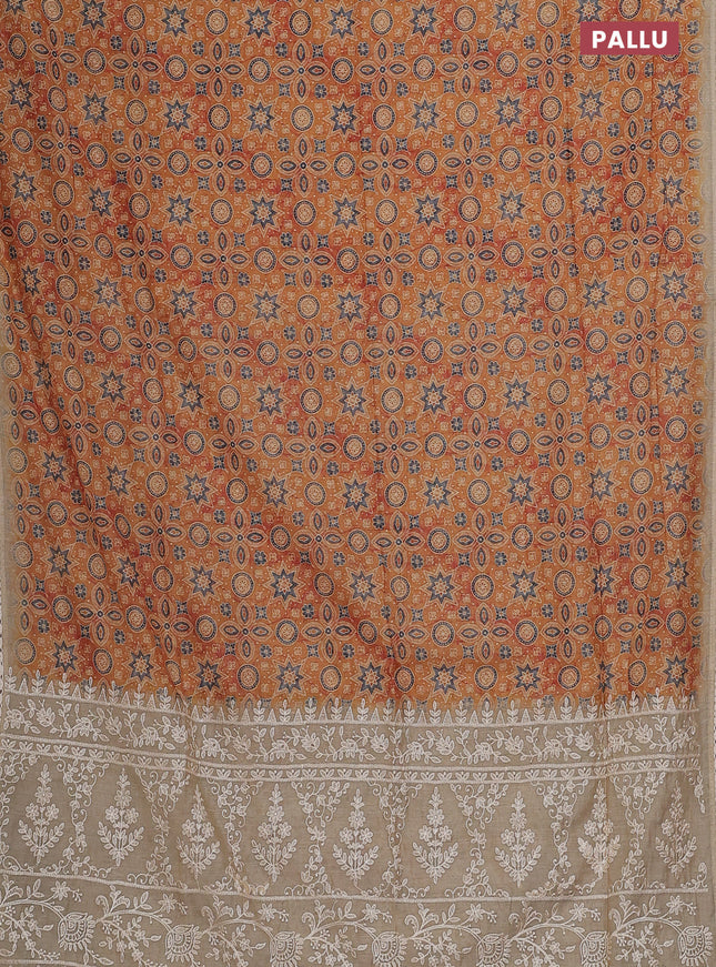 Semi chanderi saree mustard yellow and beige with allover ajrakh prints and embroidery pallu