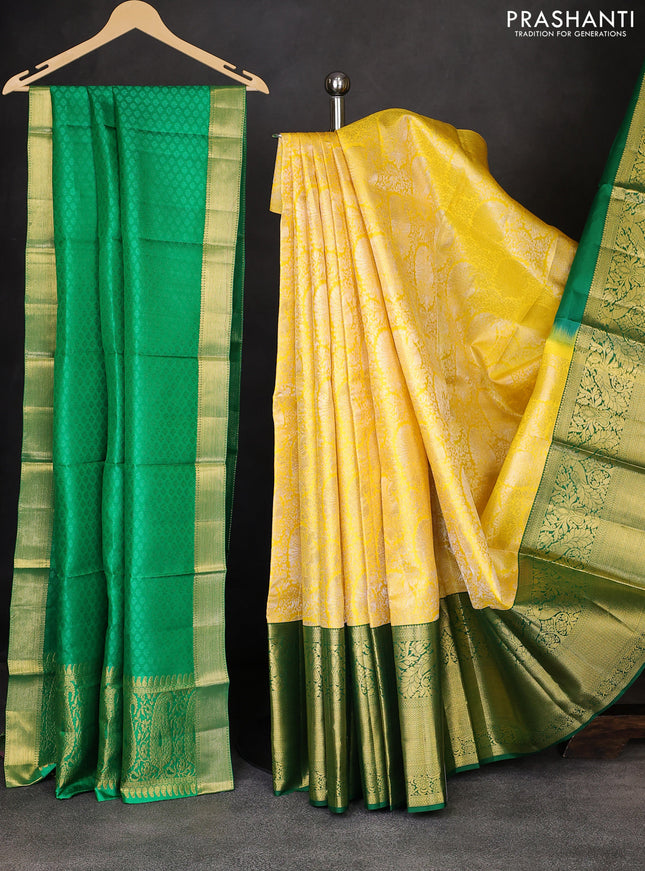 Pure kanchipuram silk lehenga lime yellow and green with allover zari woven brocade weaves and long rich zari woven peacock border