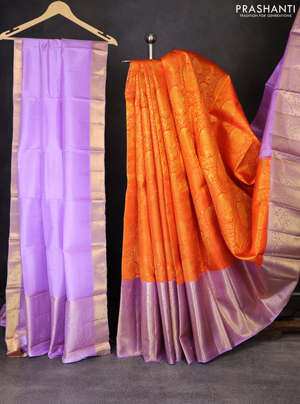 Pure kanchipuram silk lehenga orange and lavender with allover zari woven brocade weaves and long rich zari woven peacock border