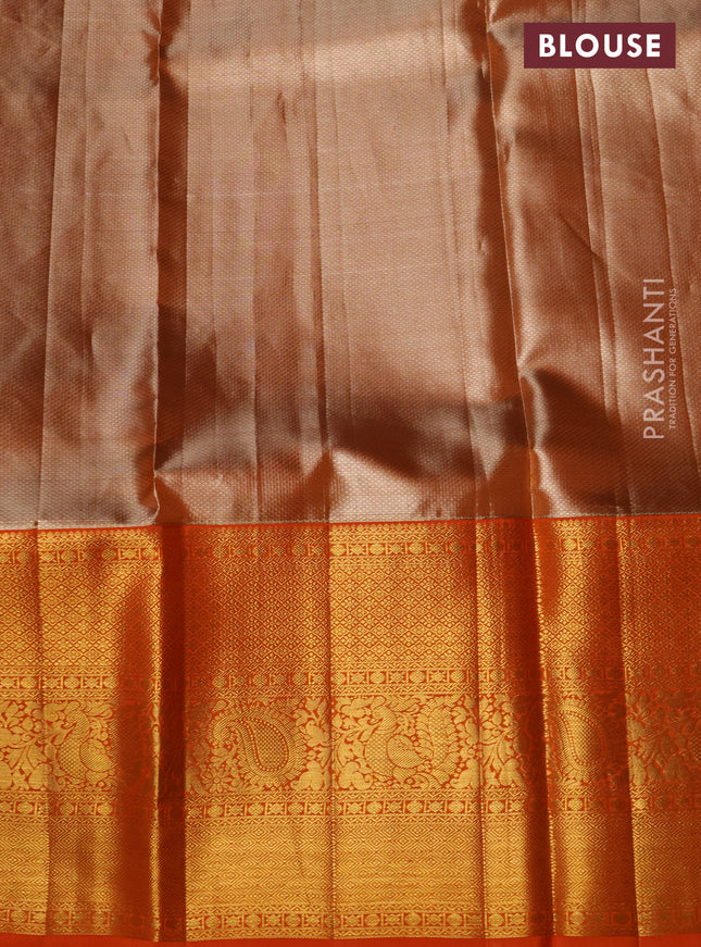 Pure kanchipuram tissue silk lehenga light blue and orange with allover zari woven floral brocade weaves and long zari woven border