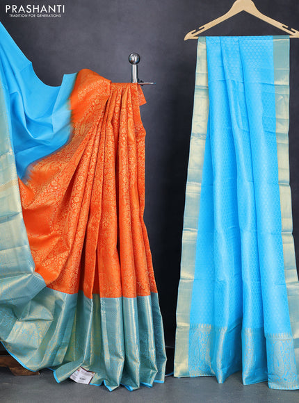 Pure kanchipuram silk lehenga orange and light blue with allover zari woven brocade weaves and long zari woven border