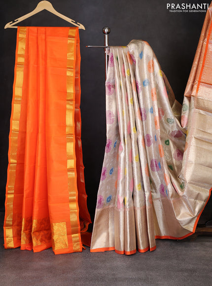 Pure kanchipuram tissue silk lehenga beige and orange with allover zari woven floral brocade weaves and long zari woven border