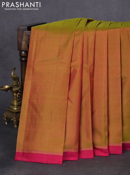 Pure kanchipuram silk saree dark mustard and maroon with plain body and zari woven simple border