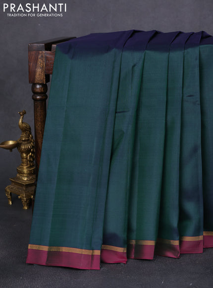 Pure kanchipuram silk saree bottle green and pink with plain body and zari woven simple border