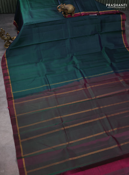 Pure kanchipuram silk saree bottle green and pink with plain body and zari woven simple border