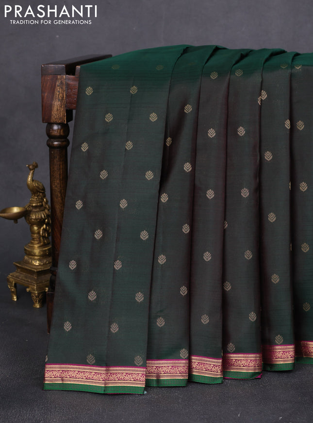 Pure kanchipuram silk saree bottle green and purple with allover zari buttas and zari woven border