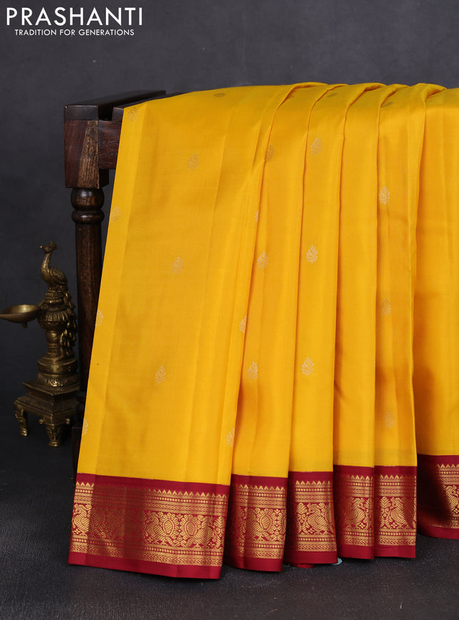 Pure kanchipuram silk saree yellow and maroon with zari woven buttas and annam zari wioven korvai border