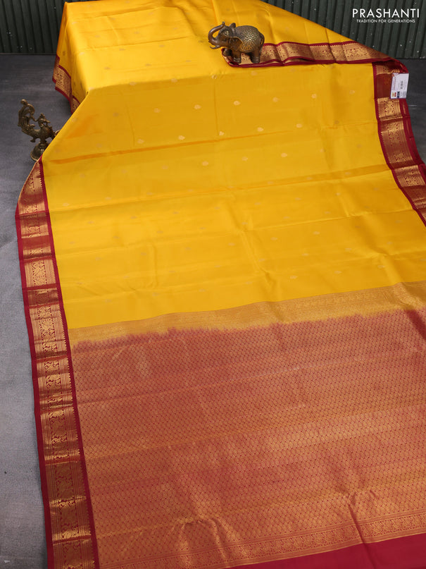 Pure kanchipuram silk saree yellow and maroon with zari woven buttas and annam zari woven korvai border