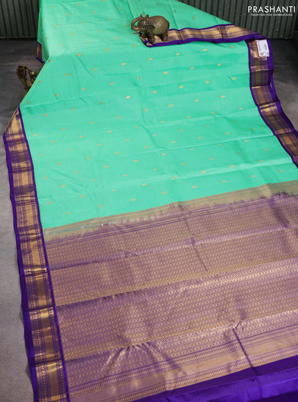 Pure kanchipuram silk saree teal green and blue with zari woven buttas and zari woven korvai border
