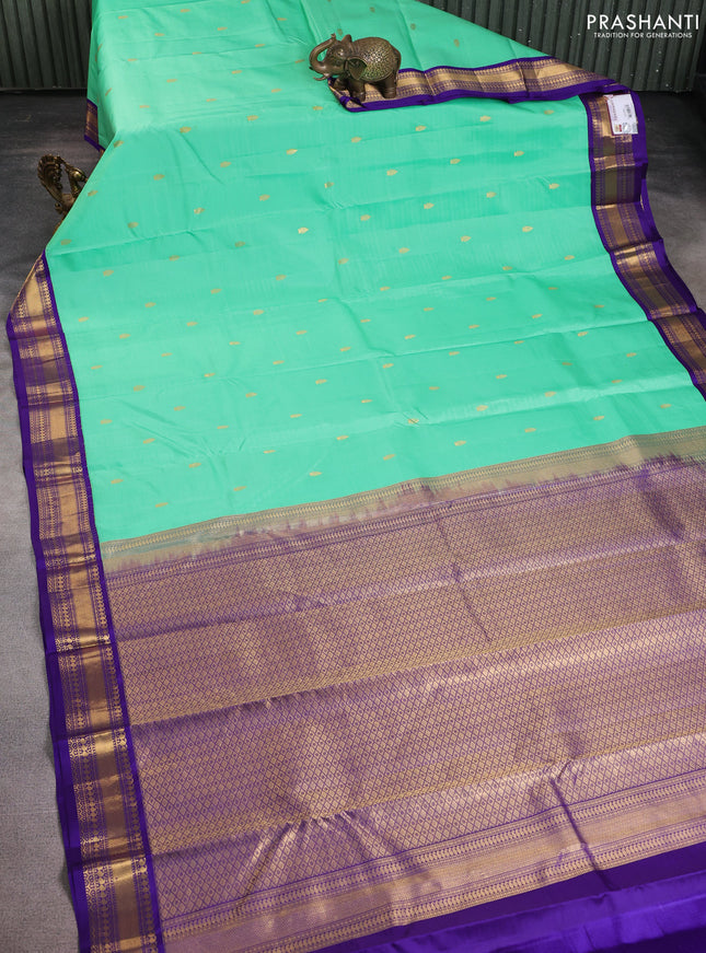 Pure kanchipuram silk saree teal green and blue with zari woven buttas and zari woven korvai border