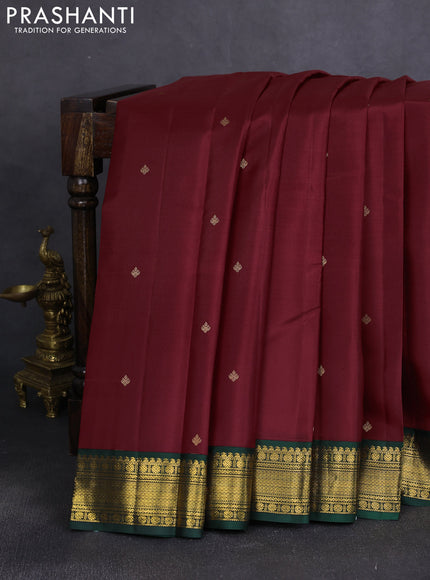 Pure kanchipuram silk saree deep maroon and bottle green with zari woven buttas and zari woven korvai border