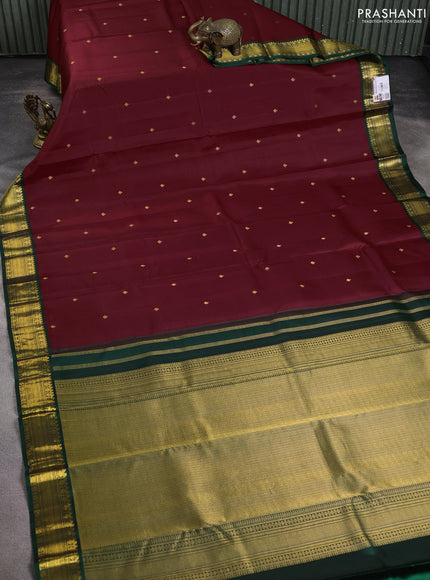 Pure kanchipuram silk saree deep maroon and bottle green with zari woven buttas and zari woven korvai border